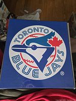 Front cover of blue binder with Toronto Blue Jays logo