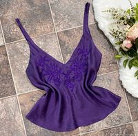 Front view of purple silk camisole showing embroidery and shape