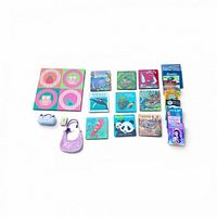 Entire lot laid out showing books, wall art, handbag, puzzle and eyeglasses case