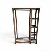 Full view of wooden garment rack with shelves and hanging rod