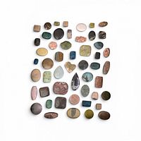 overhead view of all assorted stone beads arranged in grid