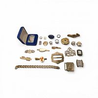 All items laid out showing quantity and variety of accessories, watches, buckle and silver pieces