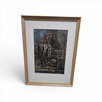 Framed print standing angled showing full frame and mat