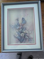 Full view of framed 3D pastel butterfly and floral wall art
