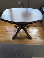 Top view of wooden coffee table showing shape and finish