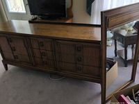 Front and side view of wood dresser and separate mirror