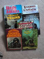 Group shot of six railroad history books