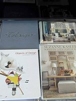 Front covers of four hardcover décor books