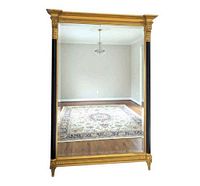 Front view of entire mirror showing gold frame and black columns
