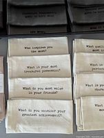 Stack of Urban Barn conversation napkins showing printed questions