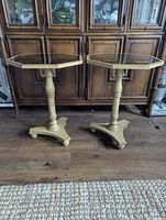 Two matching pedestal side tables front view