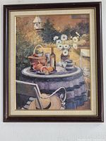 Full view of framed lithograph with frame visible