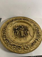 Full view embossed brass plaque