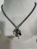 Full view of necklace displayed on bust