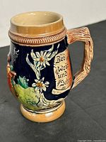 Front view of GERZ beer stein showing alpine scene and inscription panel