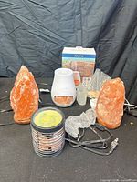 All items grouped: two salt lamps, diffuser, wax warmer, cords, salt rocks, box