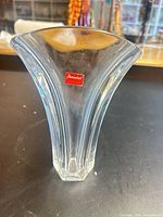 Front view of clear crystal vase with Baccarat label
