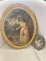 Both framed pieces side by side for scale and contents
