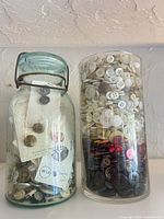 Front view of both jars showing quantity and variety of buttons