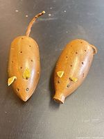 pair of wooden animal toothpick holders showing overall design and condition