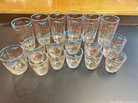 Full set of 17 glasses arranged on table
