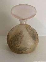 Full view of perfume bottle with stopper