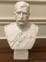 Front view of white parian bust on plinth