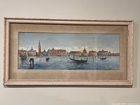 Full view of framed watercolor painting on wall