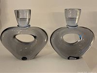 Front view of both neodymium glass candlesticks
