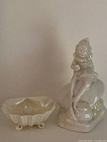 Elf figurine and shell bowl front view