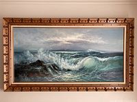 Full view of seascape painting in frame