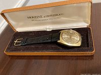 Watch in open presentation box showing overall condition and accessories