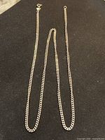 Full view of sterling silver curb chain necklace