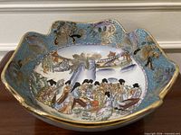 overhead view showing interior decoration, scalloped rim, color and condition