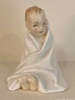 Front view of Royal Doulton “This Little Pig” figurine