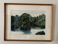 Front view of framed watercolor landscape
