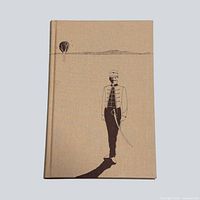Front cover of tan cloth hardcover showing illustration