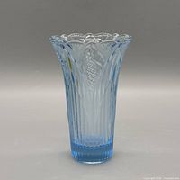 full view of blue-clear pressed glass vase
