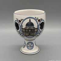 Front view showing St. Paul’s Cathedral and cameo silhouettes