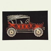 Full view of 12 x 8 in string art plaque depicting vintage car