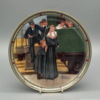 Front view of plate showing Rockwell artwork and decorative rim