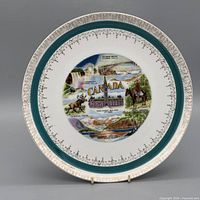 Front of plate showing Canadian landmark montage and border details