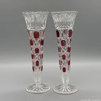 Front view of both matching ruby overlay crystal vases