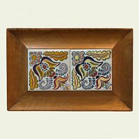 Full view of framed tray showing overall form, wood frame and both decorative tiles