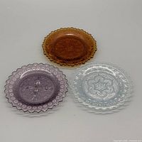 Set of three pressed glass dishes