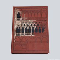 Front cover showing gilt and black architectural design on rust-brown cloth