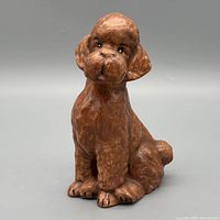front view of brown dog figurine