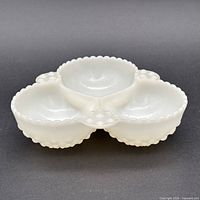 Top view showing three compartments and scalloped edges