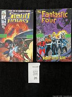 Front covers of both comic books side by side