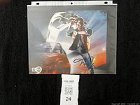 Full view of signed photo in sleeve